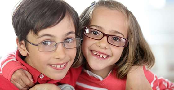 Image of kids wearing glasses. 