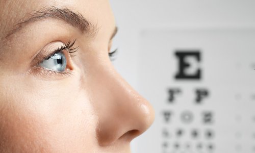 Woman receiving an eye exam 